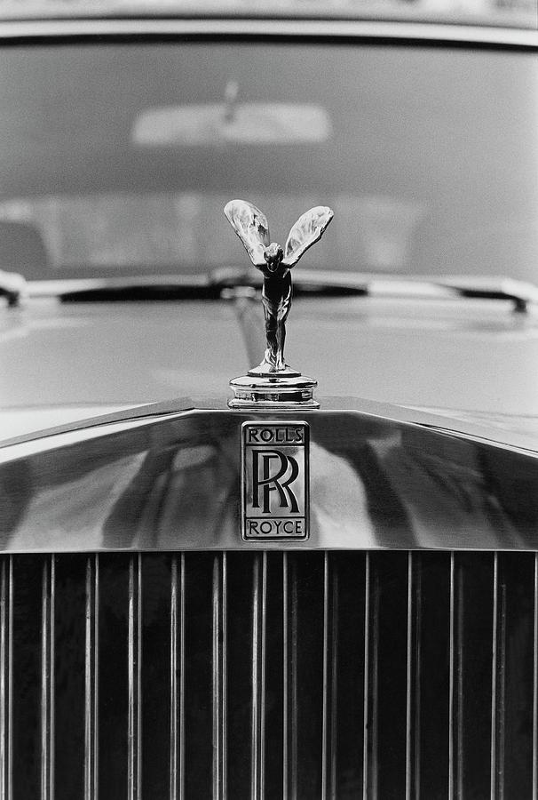 Rolls Royce Emblem on Classic Car Photograph - A 1974 Rolls Royce #1 by Peter Levy