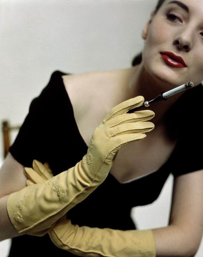 vogue cigarette holder A Model Holding A Alfred Orlik Cigarette Holder by Serge Balkin