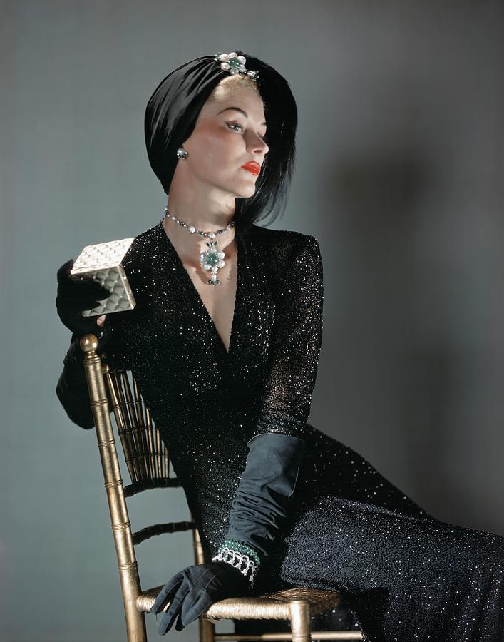 A Portrait Of Lisa Fonssagrives Sitting by Horst P. Horst