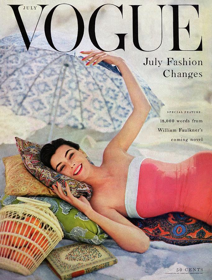 Vintage Vogue Cover with Model Photograph - A Vogue Cover Of Anne Gunning Under An Umbrella by Karen Radkai