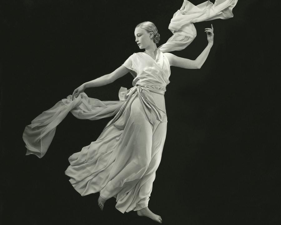 Graceful Woman in Flowing Dress Photograph - A Young Model Wearing A Vionnet Dress by George Hoyningen-Huene