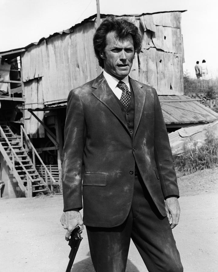Man Holding Gun in Dusty Suit Photograph - Clint Eastwood is Dirty Harry by Silver Screen