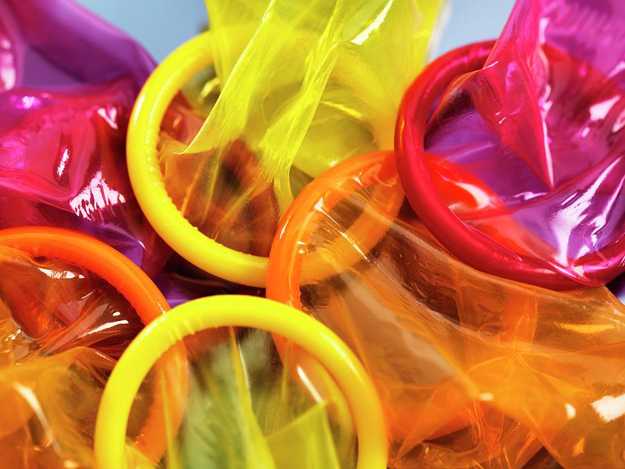 Color Change Condoms Coloured Condoms by Tek Image / Science Photo Library