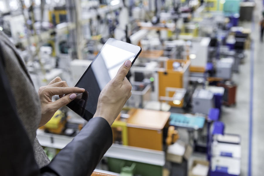 Female Manager Working On Tablet In Factory Yoh4nn