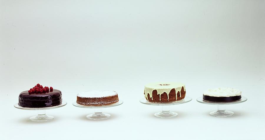Four Cakes Side By Side Photograph by Romulo Yanes