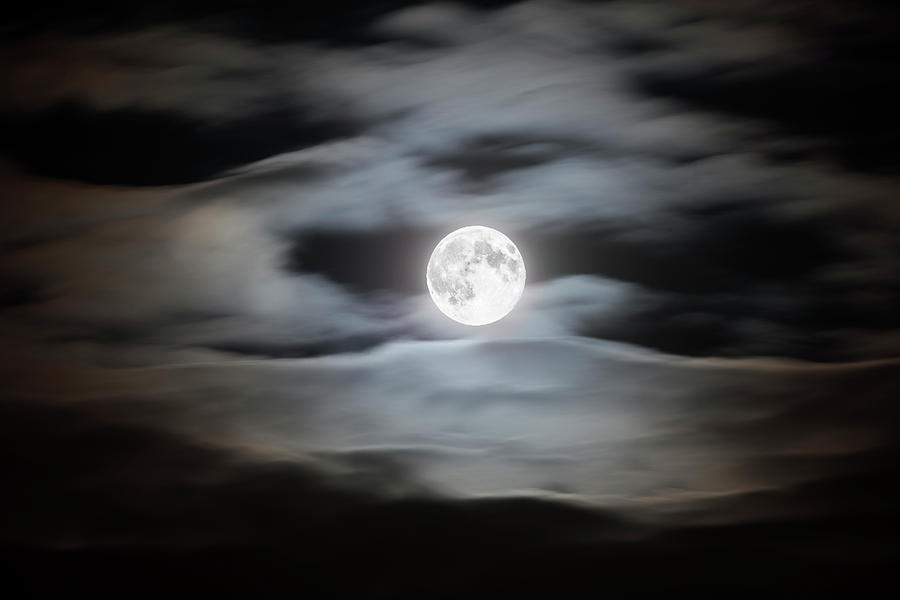 Full Moon On A Cloudy Night Sky by Bjorn Holland