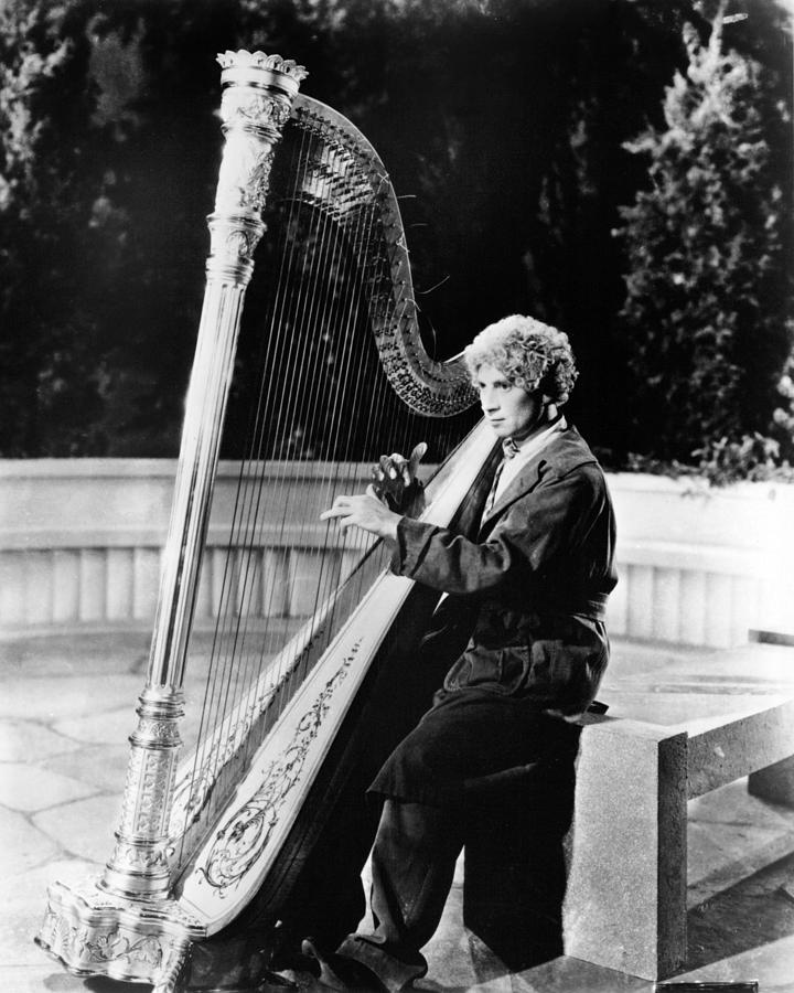 Famous Comedian Playing Harp Photograph - Harpo Marx by Silver Screen
