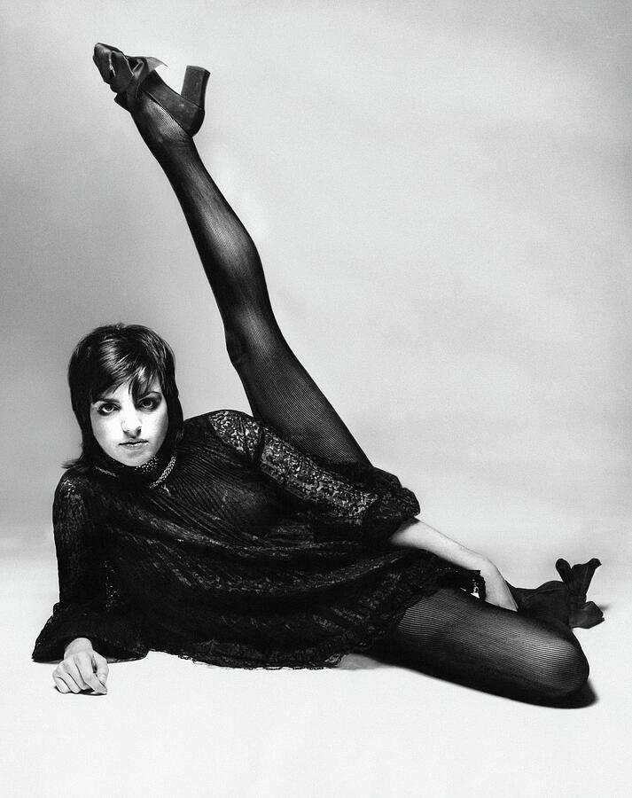 Groovy Pose with Raised Leg Photograph - Liza Minnelli With Her Leg Raised by Bert Stern