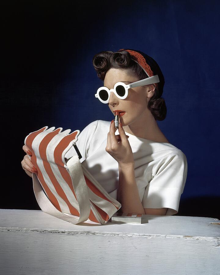 Retro Style with Bold Sunglasses Photograph - Muriel Maxwell Applying Lipstick by Horst P Horst
