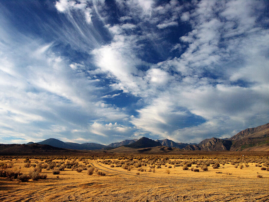 Expansive Desert Skies Over Mountains Photograph - Near the Intersection of God and the Eastern Sierras by Joe Schofield