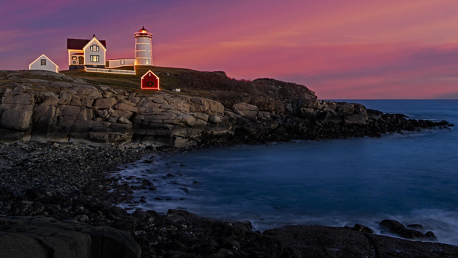Sunset at Cape Neddick Lighthouse Photograph - Nubble Lighthouse At Sunset by Susan Candelario