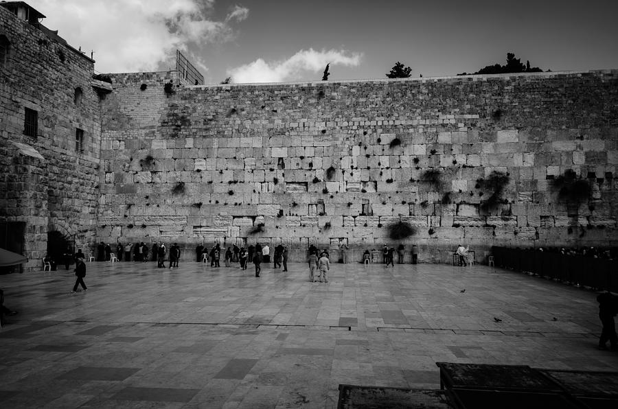 Historic Western Wall in Jerusalem Photograph - Praying at the Western Wall by David Morefield