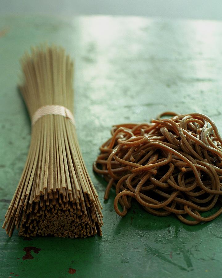 Raw And Cooked Pasta Photograph by Romulo Yanes