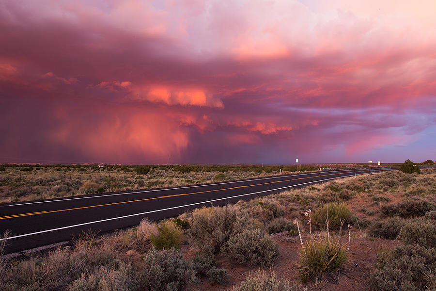 Road With Sunset Storm Clouds In Arizona by By Yuri Kriventsov