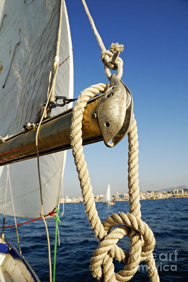 Sailing Adventure on Blue Waters Photograph - Rope on sailboat mast during navigation by Sami Sarkis Photography