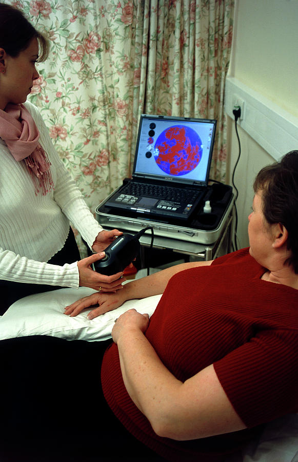 Skin Lesion Diagnosis by Tracy Rutter / Science Photo Library