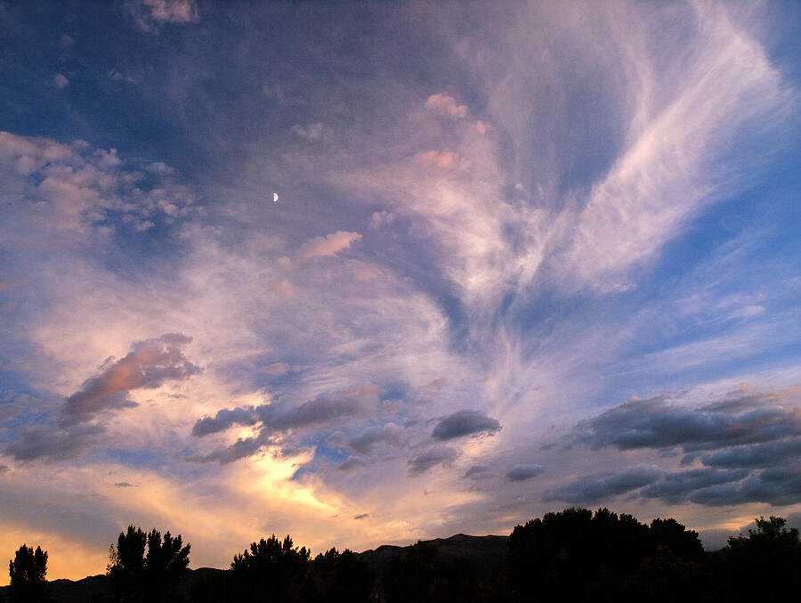 Sun sets over Millpond Music Festival. Bishop  California. Photograph by Joe Schofield