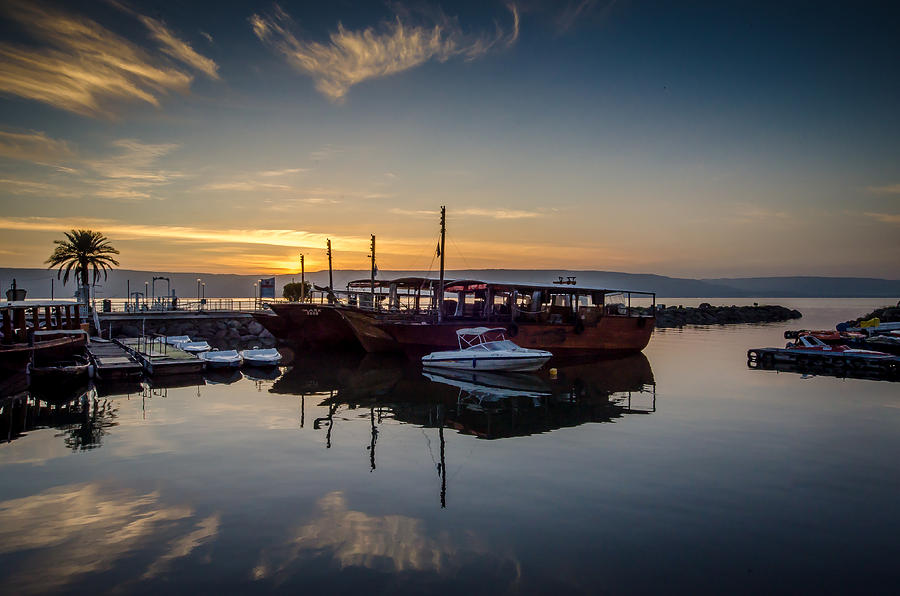 Serene Harbour at Sunset Photograph - Sunrise over the Sea of Galilee by David Morefield