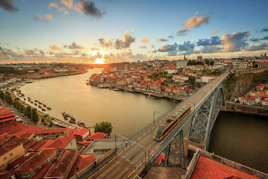 https://images.imagerenderer.com/images-medium-large-5/sunset-over-the-beautiful-city-of-porto-patrik-bergstrm.jpg