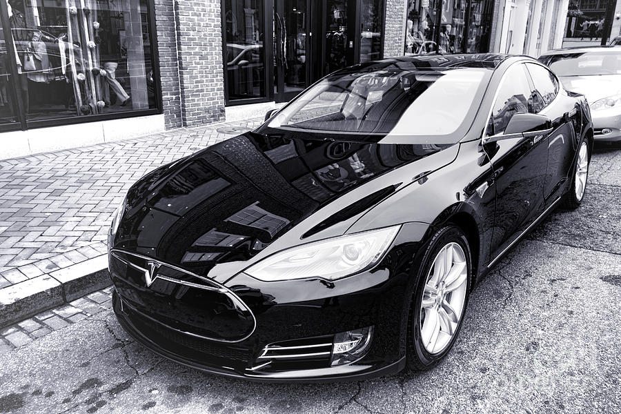 Sleek Black Tesla Parked in Urban Setting Photograph - Tesla Model S by Olivier Le Queinec