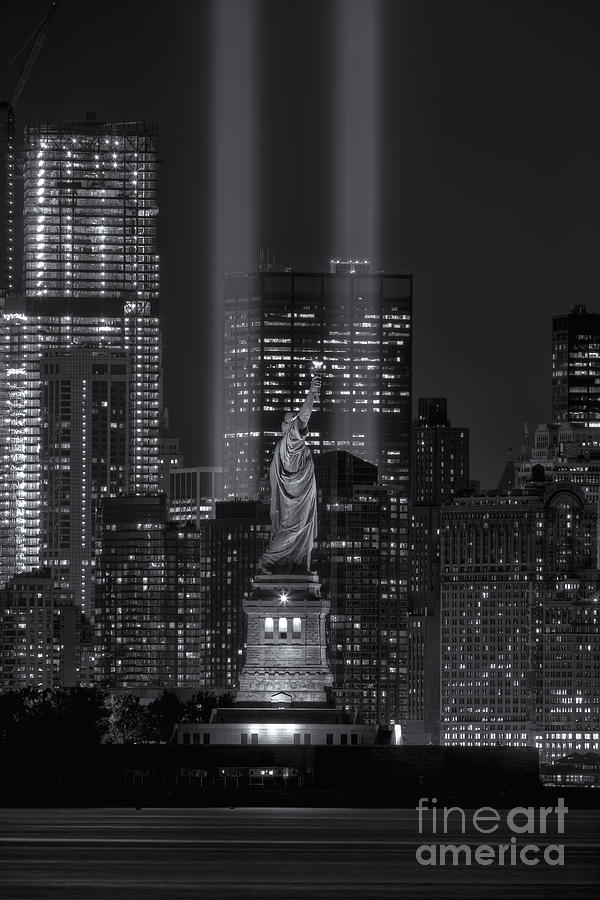Statue of Liberty at Night with City Lights Photograph - Tribute in Light XVI by Clarence Holmes