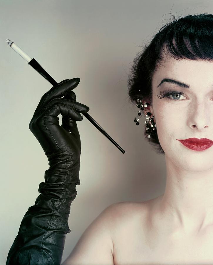 how to hold a long cigarette holder Victoria Von Hagen Holding A Cigarette Holder by Erwin Blumenfeld