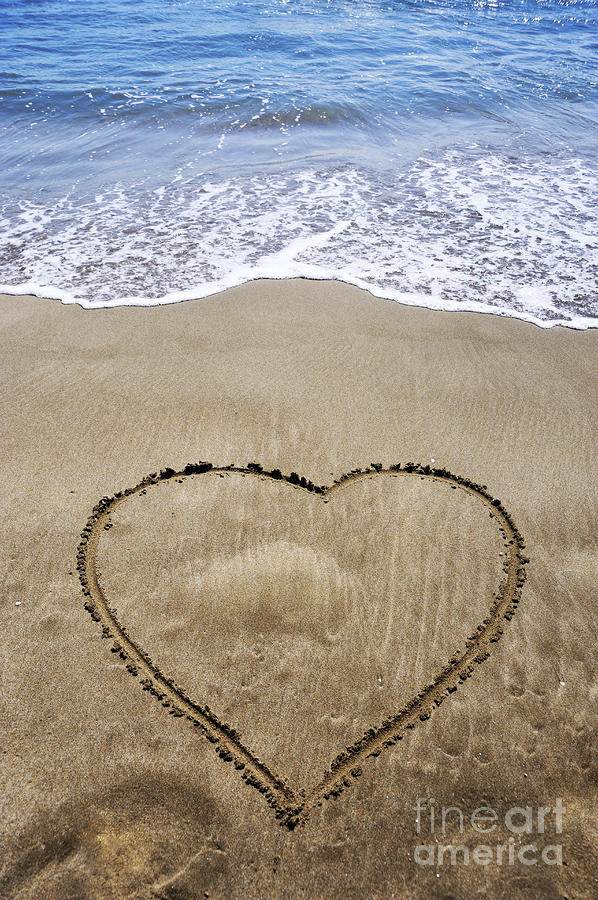 Heartshape drawn in sand on beach Photograph by Sami Sarkis Photography