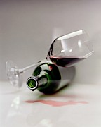A Wine Bottle And A Glass Of Wine Photograph by Romulo Yanes