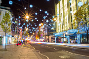 Christmas in Oxford Street Photograph by Andrew Lalchan