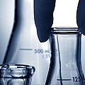 Laboratory Erlenmeyer Flasks in Science Research Lab by Science Research Lab