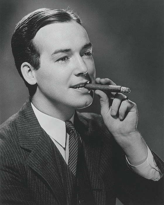 b&w cigarettes First Versions: Winston Man Smoking Cigar In Studio,
