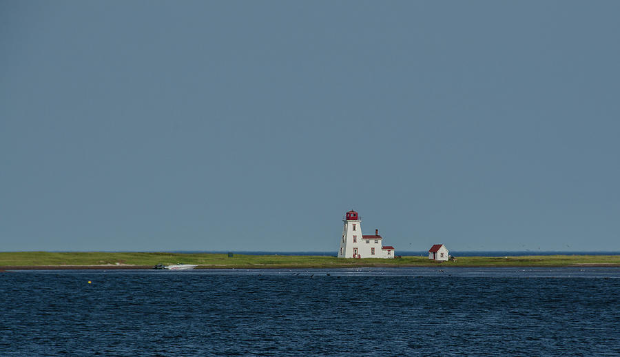 Calming Blue Sea and Sky Frame Distant Lighthouse Photograph by Douglas Wielfaert