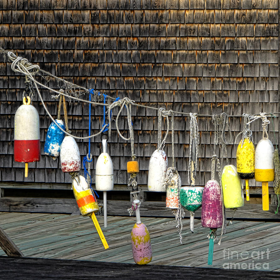 Colorful Buoys on Rustic Wall Photograph - Classic Maine by Olivier Le Queinec