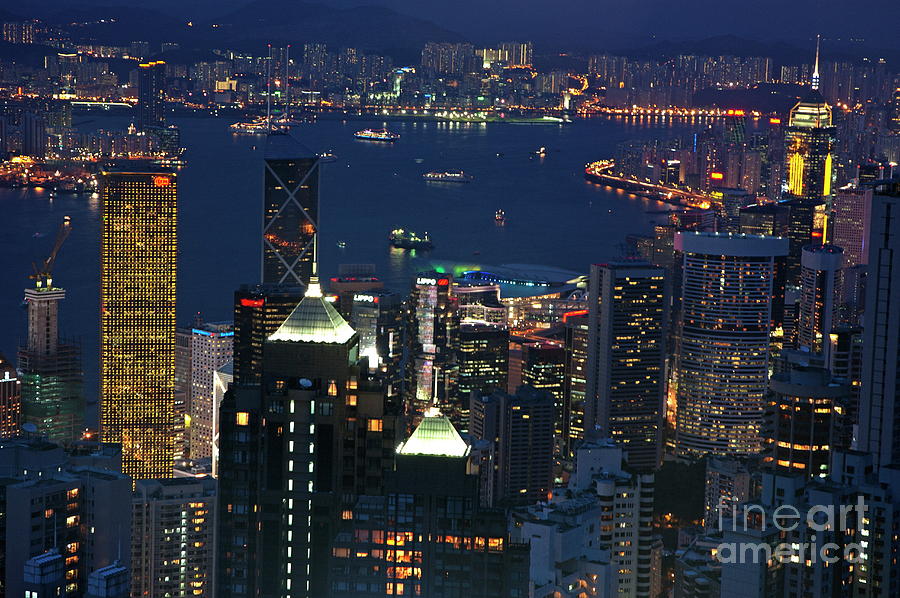 Kowloon skyline and Victoria Harbour at dusk Photograph by Sami Sarkis Photography