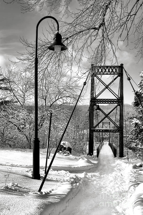 Winter Scene at a Snowy Bridge Photograph - Lamppost and Androscoggin Swinging Bridge in Winter by Olivier Le Queinec