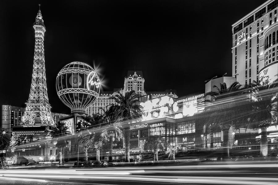 Las Vegas Nightscape with Eiffel Tower Photograph - Las Vegas Strip Light Show BW by Susan Candelario