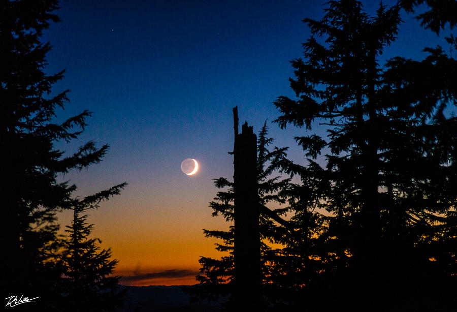 Moonset at Sunset Photograph by Russell Wells