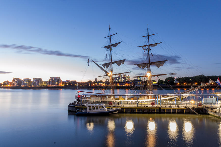 Reflections of tall ships Photograph by Andrew Lalchan