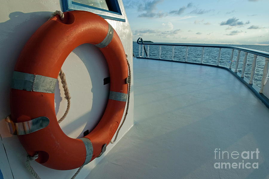 Rescue buoy on a boat middle deck Photograph by Sami Sarkis Photography