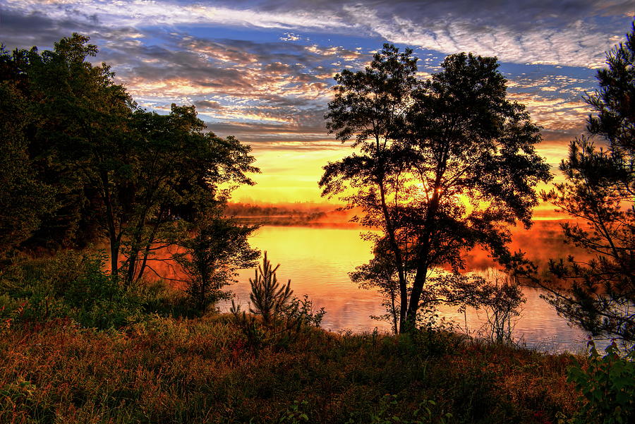 Rhinelander Flowage Sunburst Photograph by Dale Kauzlaric