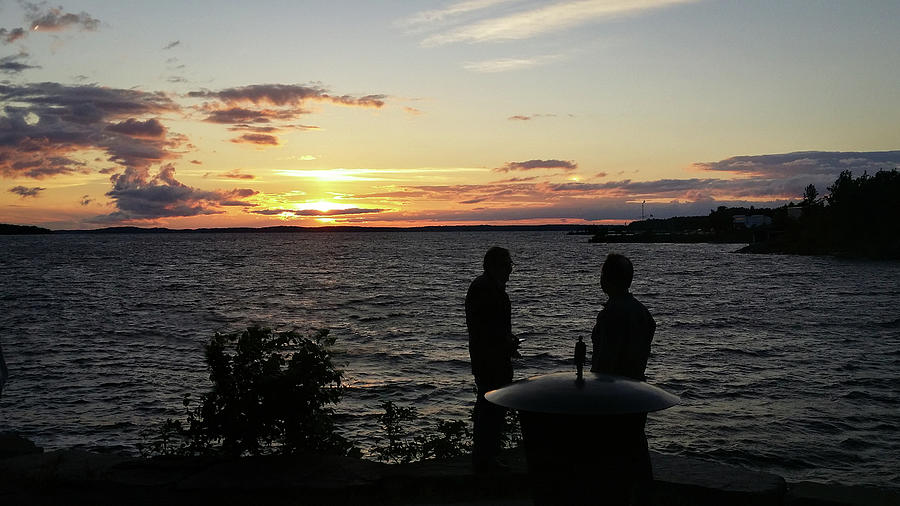 Sunset chat Photograph by Al Poullis