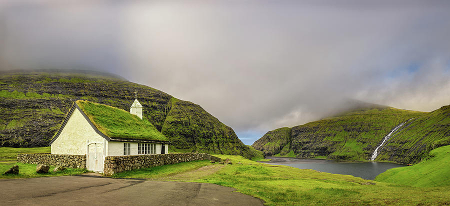Village church and a lake in Saksun, Faroe Islands, Denmark Photograph by Miroslav Liska