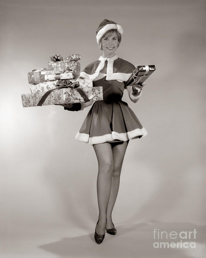 Woman In Sexy Santa Outfit, C.1960s by H. Armstrong Roberts/ClassicStock