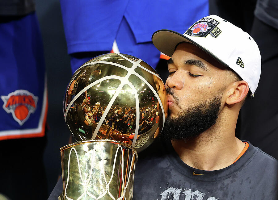 Karl-Anthony Towns Kisses the 2026 NBA Championship Trophy by Gregory Shamus