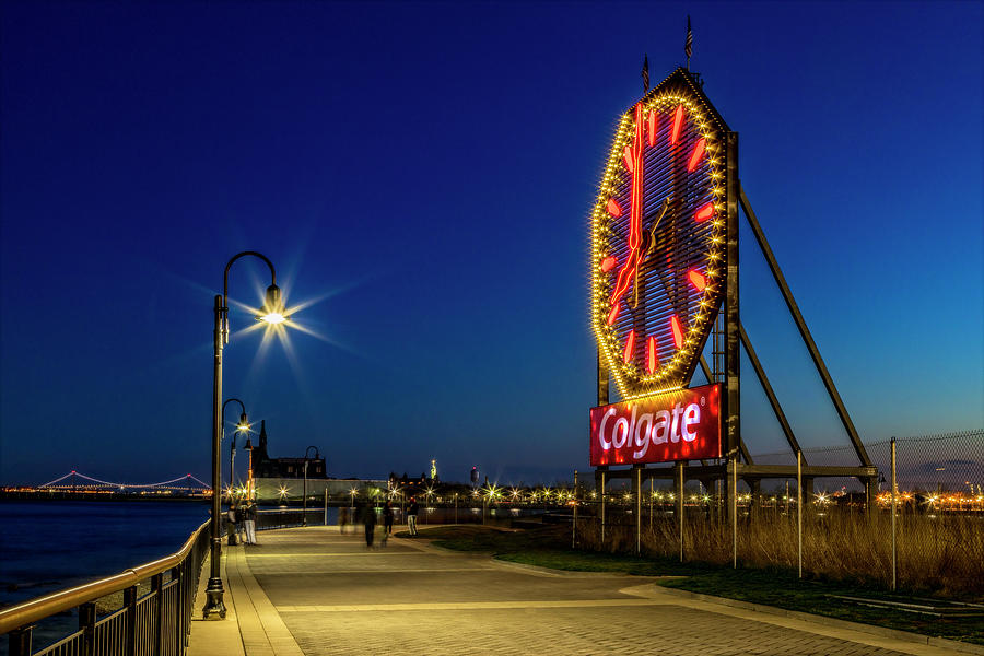 Illuminated Colgate Clock at Dusk Photograph - Illuminated Colgate Clock by Susan Candelario