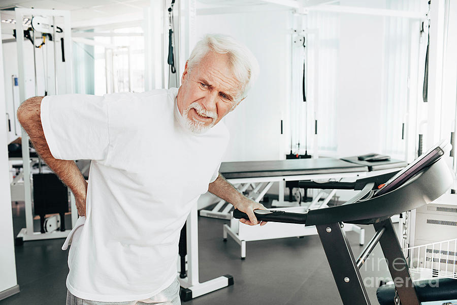 Hackache Man With Backache #1 by Peakstock / Science Photo Library