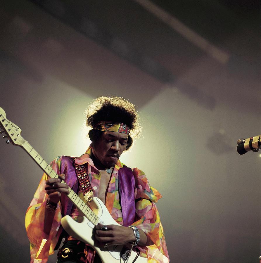 Guitarist on Stage with Vibrant Attire Photograph - Photo Of Jimi Hendrix #1 by David Redfern