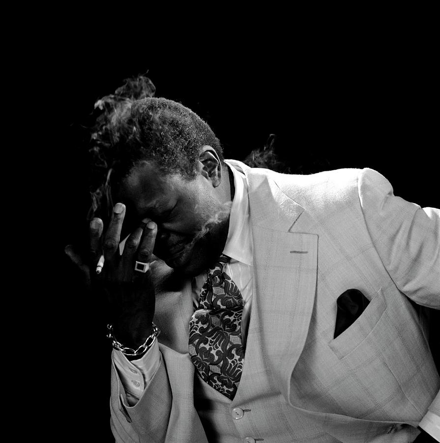 Man in Contemplative Pose Photograph - Photo Of Oscar Peterson #1 by David Redfern