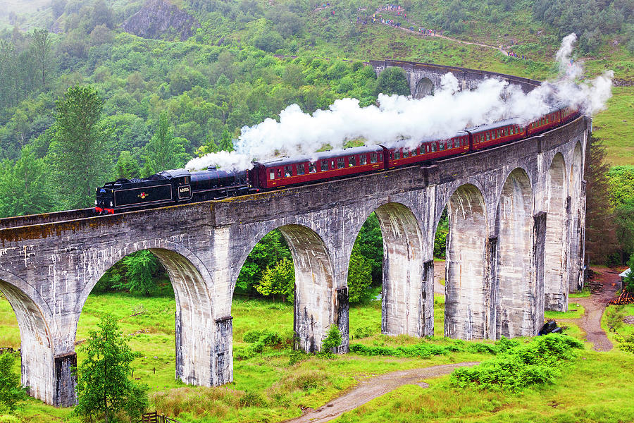 Uk, Scotland, Highland, Glenfinnan, Great Britain, Highlands, British Isles, Jacobite Steam Train On The Glenfinnan Viaduct Which Inspired The Harry Potter Hogwarts Express #1 Digital Art by Luigi Vaccarella