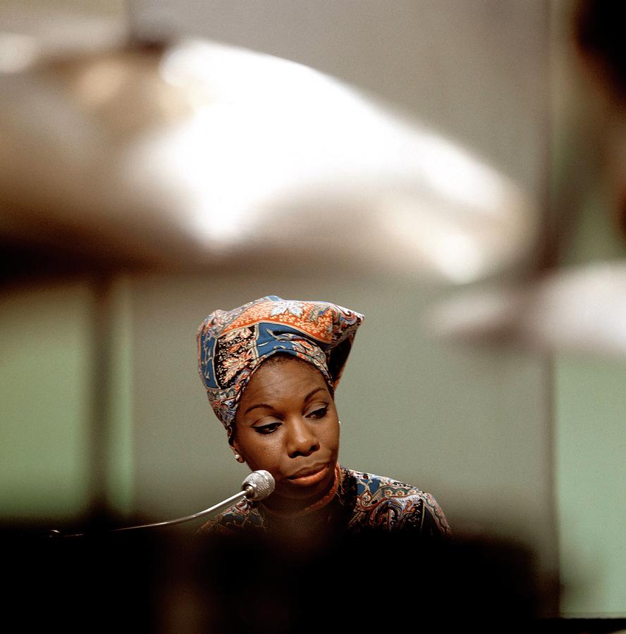 Iconic Pianist in a Colorful Headwrap Photograph - Photo Of Nina Simone #4 by David Redfern